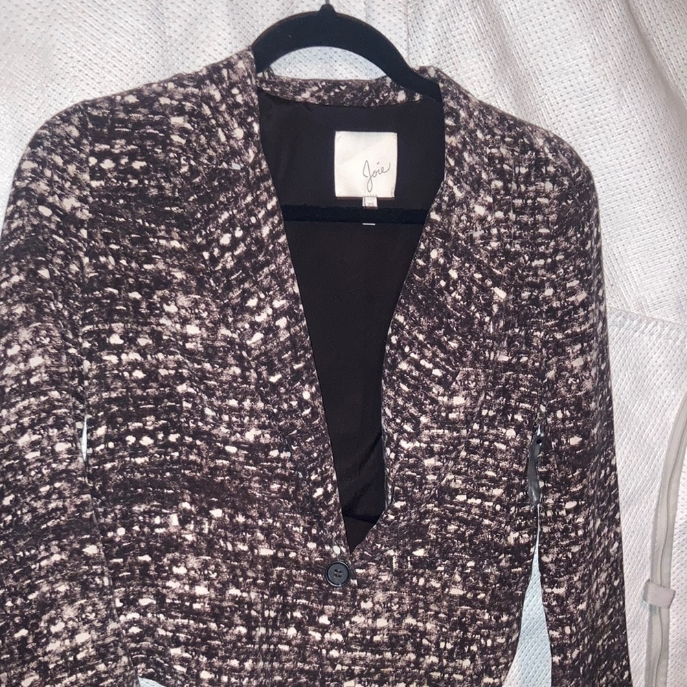 Never worn jacket with artistic design and beautiful color